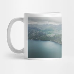 At the edge of a cliff Mug